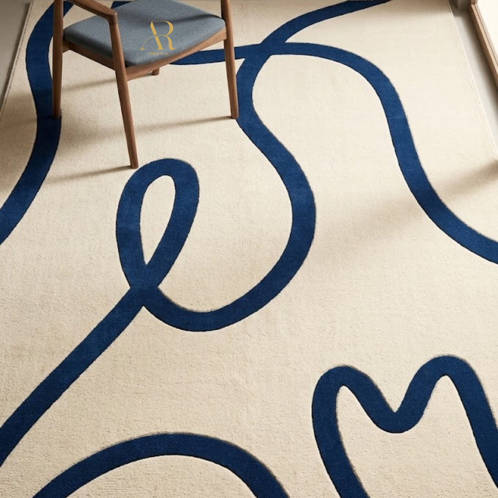 Beige carpet with blue abstract patterns and a chair partially visible.