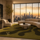 A modern living room with a large olive green and dark green abstract patterned area rug, a curved cream sectional sofa, and a round stone coffee table, set against a backdrop of floor-to-ceiling windows showing a city skyline at sunset.