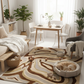 Living room with a dog lying on a patterned rug, surrounded by furniture and plants.
