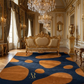Luxurious room with ornate furniture, chandeliers, and a patterned rug.