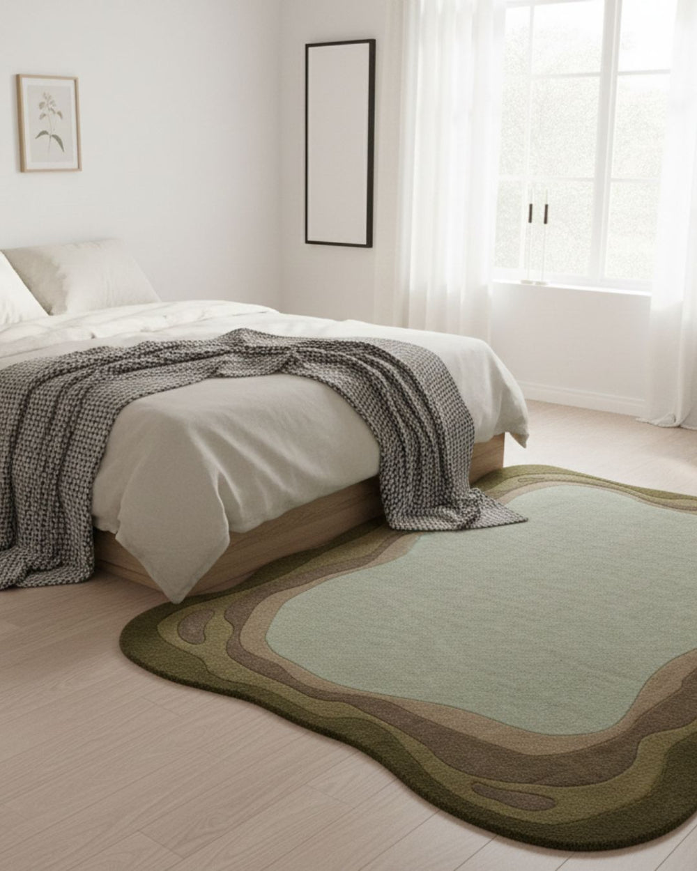 Bedroom with a green and brown rug in front of a bed