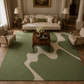 A large area rug with an abstract organic pattern in sage green and cream, styled in a classic, elegant living room with a cream sofa, wooden coffee table, and matching armchairs.