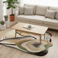 Living room with a beige sofa, wooden coffee table, and a decorative rug.