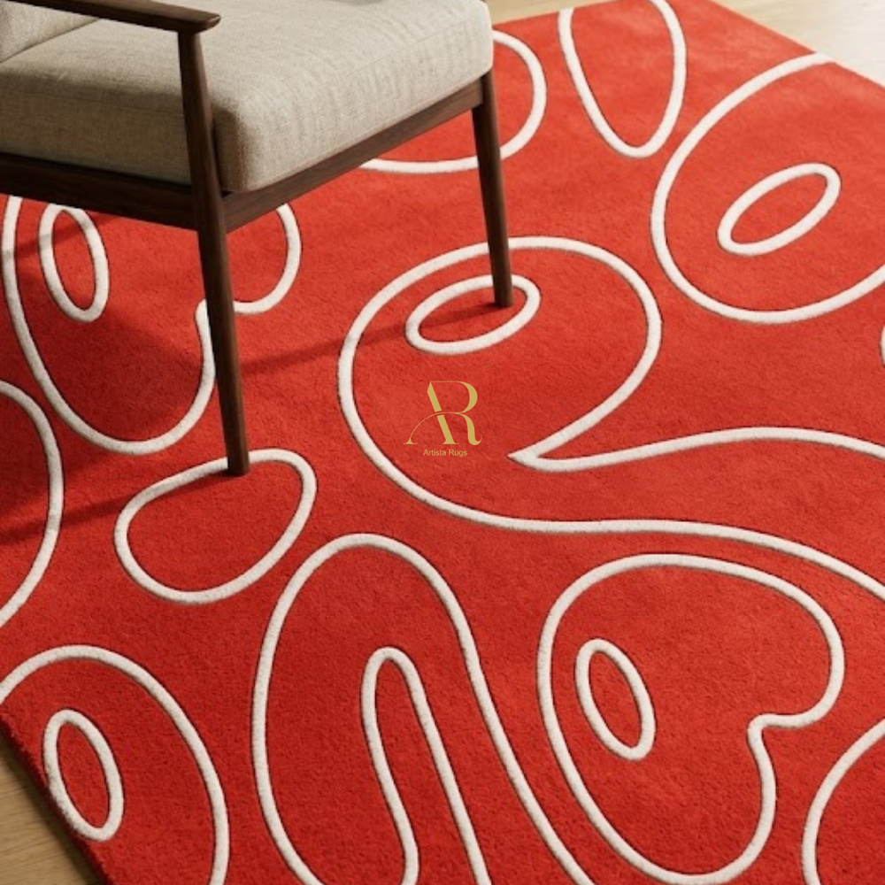 Red rug with white patterns and a chair on it