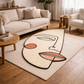 Abstract face rug on a wooden floor in a living room setting