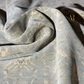 Close-up of textured fabric with a subtle pattern