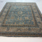 Decorative rug with intricate patterns on a plain background