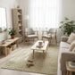 Modern living room with neutral tones, furniture, and decor.