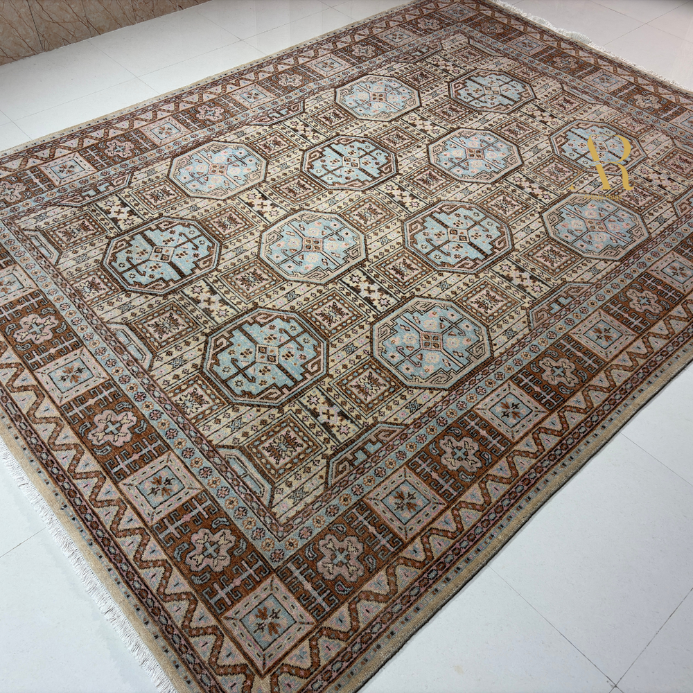 Decorative rug with geometric pattern on a white floor