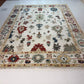 Decorative rug with intricate patterns on a white floor