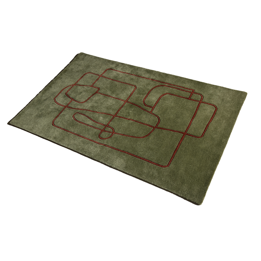 Green rug with red geometric pattern on a white background
