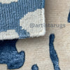 Knotted natural themed rug