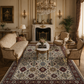 Luxurious living room with ornate furniture, a chandelier, and decorative elements.