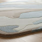 Rug with abstract pattern on a wooden floor