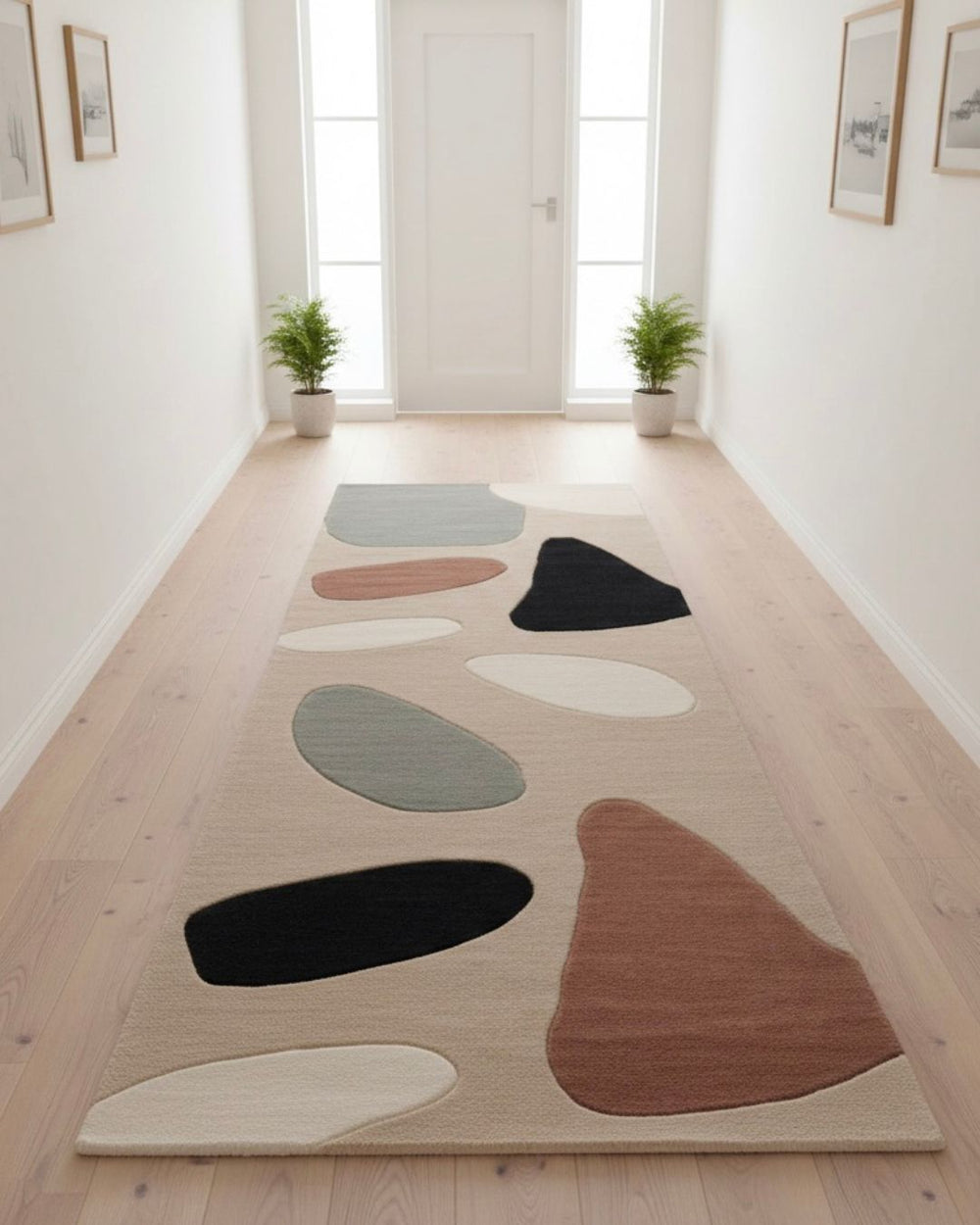 Colorful abstract rug on a wooden floor with large windows in the background