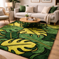 Living room with a green and yellow leaf-patterned rug, beige sofa, and wooden coffee table.