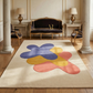 Colorful abstract rug on a wooden floor with a classical room setting.