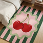 Decorative rug with cherry design on a bedroom floor