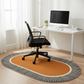 Modern office setup with a desk, chair, and decorative rug.