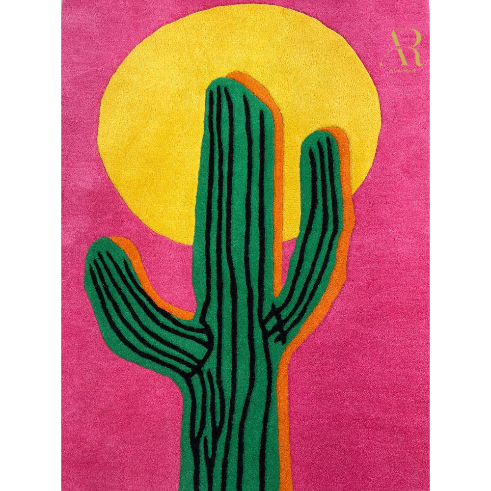 Rug with a green cactus and yellow sun design on a pink background