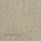 A close-up of a luxurious rug with a pearl-like finish