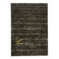 A rectangular dark brown textured rug with vertical distressed stripes and a gold monogram logo in the bottom right corner, displayed on a clean white background.