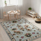 Children's playroom with a floral rug, table, and chairs.
