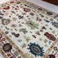 Decorative rug with intricate patterns on a plain background