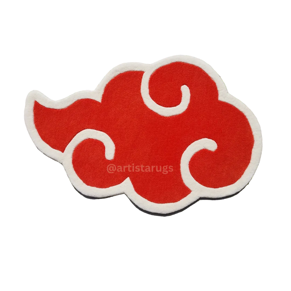 Red cloud-shaped rug with white border on a white background