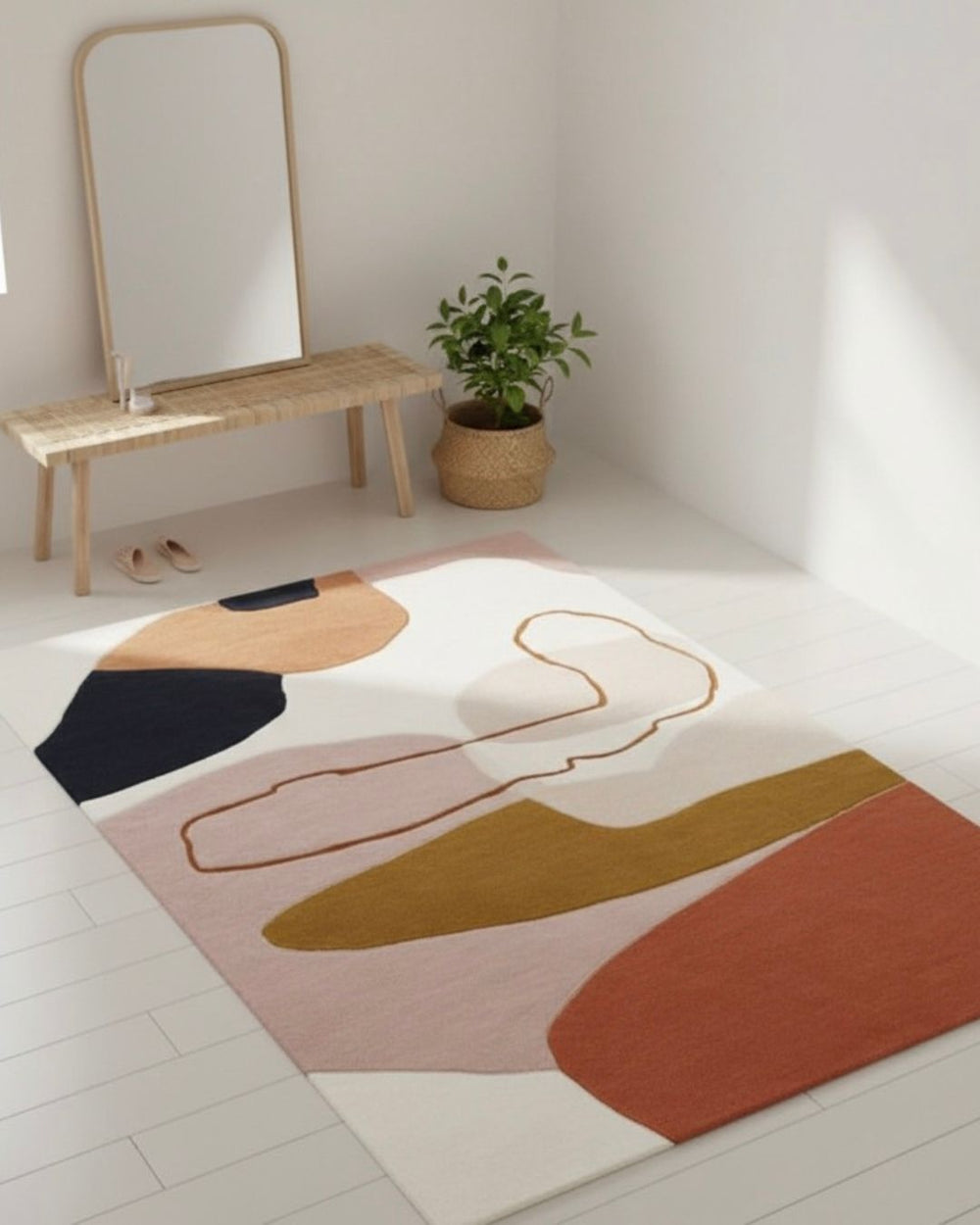 Colorful abstract rug on a light wooden floor with a mirror and plant in the background.