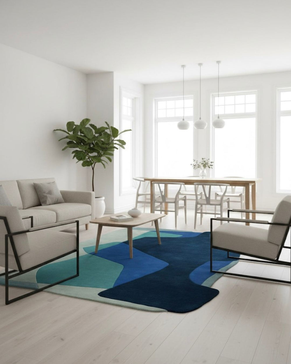 Modern living room with a blue abstract rug, white sofa, and wooden coffee table.