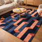 Geometric patterned rug in a living room with a coffee table and furniture.