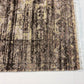 Textured area rug with abstract pattern on a white background