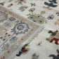 Close-up of a patterned rug with intricate designs.