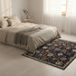 Bedroom with a patterned rug on the floor