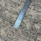 Textured fabric with a ruler for scale
