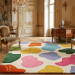 Colorful abstract rug in a grand room with ornate decor