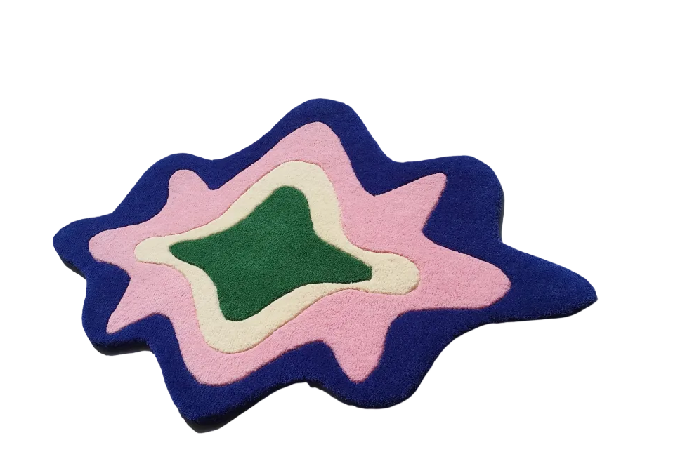 Colorful abstract rug with small potted plants on a white background