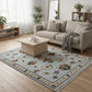 Living room with a floral-patterned rug, beige sofa, and wooden coffee table.