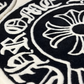 Close-up of a black and white patterned fabric with floral design