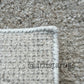 Rug with a sandy glaze effect