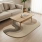 Modern living room with a wavy patterned rug, wooden coffee table, and beige sofa.