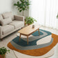 Modern living room with a colorful round rug, beige sofa, and wooden coffee table.