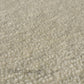 Decorative rug with a shiny surface reminiscent of pearls