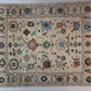 Decorative rug with intricate patterns on a plain background
