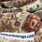 Close-up of patterned rugs with a visible brand label at www.artistarugs.com.