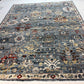 Decorative rug with intricate patterns on a white floor
