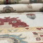 Close-up of patterned rugs with intricate designs.