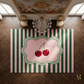 Decorative rug with cherry design on a wooden floor