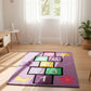 Colorful children's rug with numbers and shapes on a wooden floor.